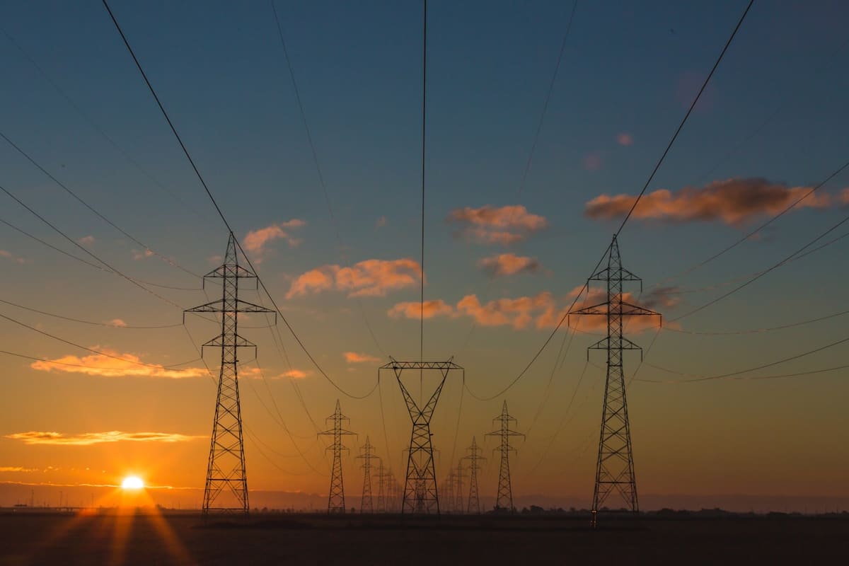 Electrical transmission towers at dusk